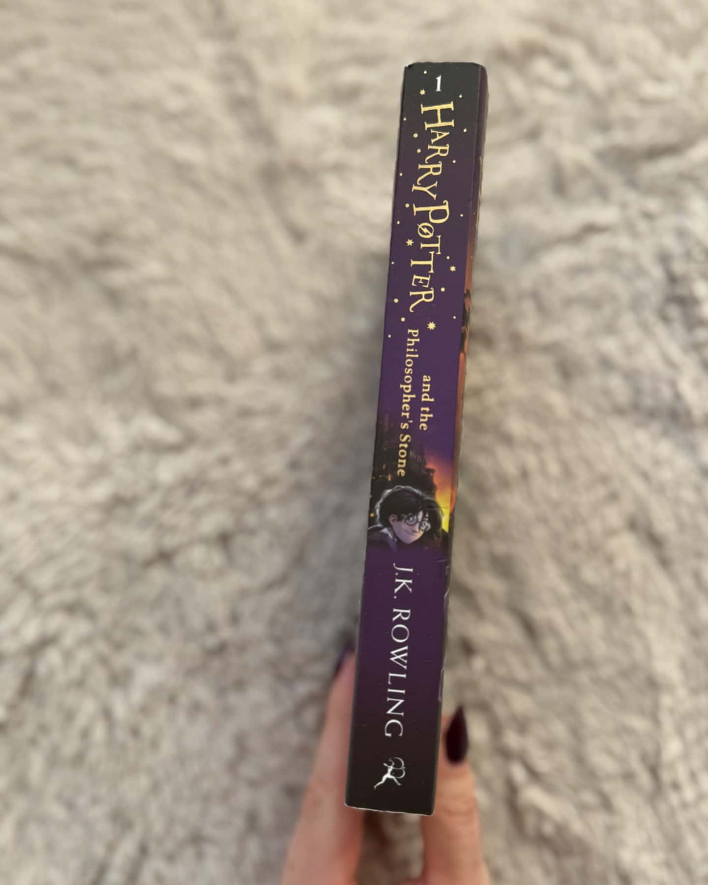 Harry Potter and the Philosopher’s stone.-J. K. Rowling