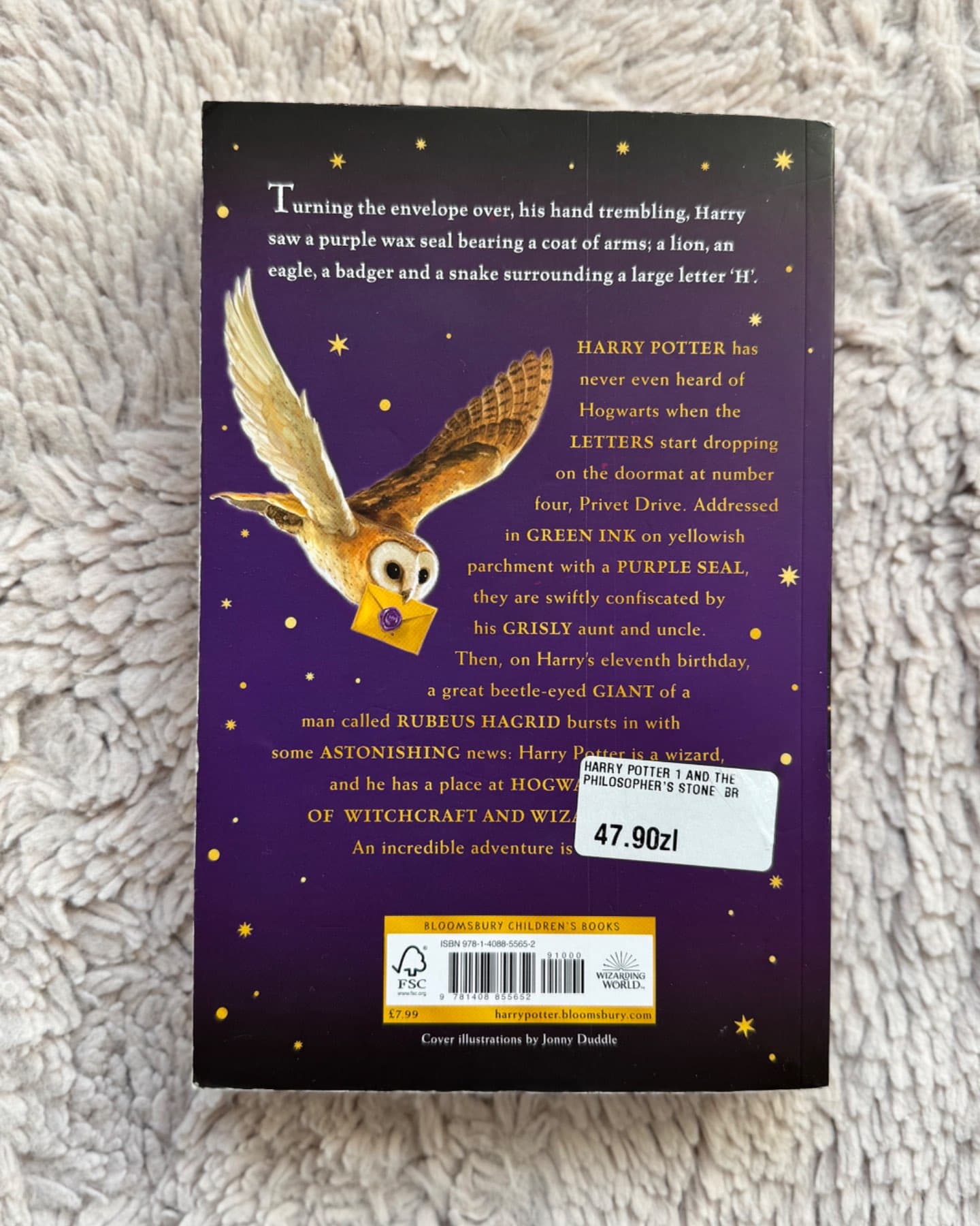 Harry Potter and the Philosopher’s stone.-J. K. Rowling